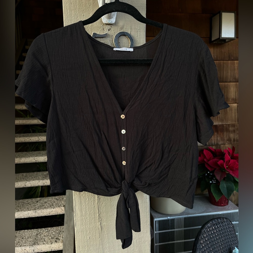 black button top with tie on the bottom